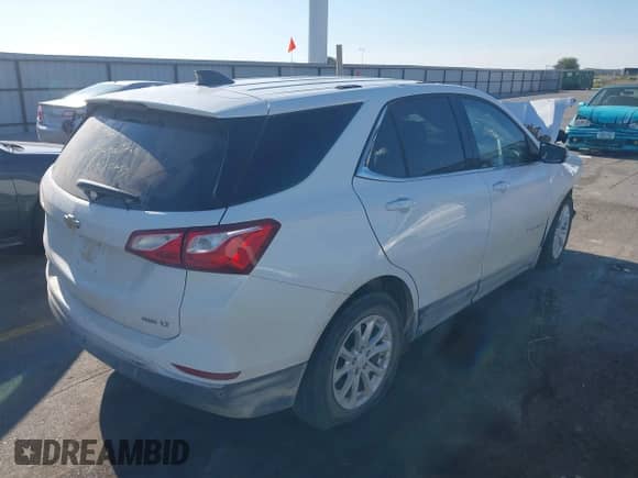 2018 Chevrolet Equinox LT with VIN 2GNAXSEV8J6194163, listed as a IAAI auction lot 43099831 with 97,376 mi miles and . Bid and sale history available at DreamBid. Image 4.
