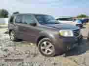 2014 Honda Pilot EX with VIN 5FNYF3H43EB020312, listed as a Copart auction lot 66866635 with 142,839 mi miles and Salvage title. Bid and sale history available at DreamBid. Image 4.
