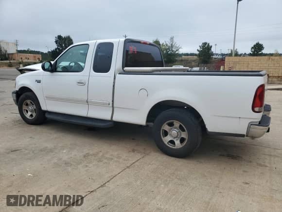 2003 Ford F-150 XL with VIN 1FTRX17213NB44096, listed as a Copart auction lot 85324585 with 247,714 mi miles and Salvage title. Bid and sale history available at DreamBid. Image 2.