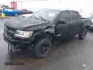 2020 Chevrolet Colorado 4WD Z71 with VIN 1GCPTDE11L1214072, listed as a IAAI auction lot 41501081 with 76,005 mi miles and . Bid and sale history available at DreamBid. Image 2.