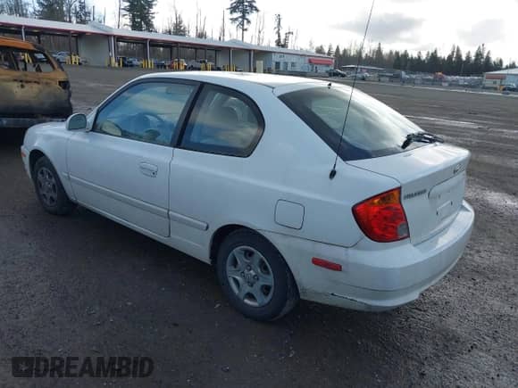 2004 Hyundai Accent GL z VIN KMHCG35C74U303431, wystawiony jako IAAI lot #41725717 z przebiegiem 211 893 mil mil oraz . Historia ofert i sprzedaży dostępna na DreamBid. Obrazek 3.