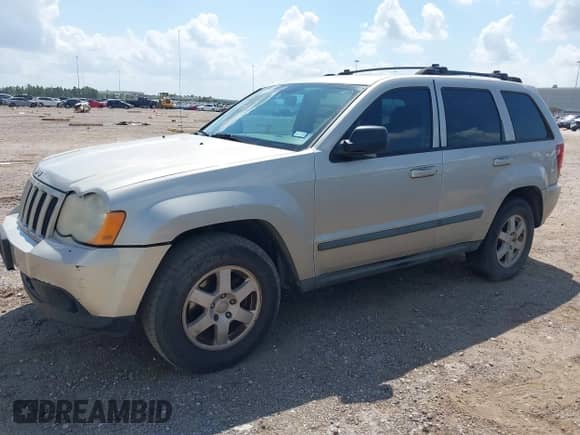2009 Jeep Grand Cherokee Laredo with VIN 1J8GS48K19C508293, listed as a IAAI auction lot 43037613 with 220,733 mi miles and . Bid and sale history available at DreamBid. Image 2.