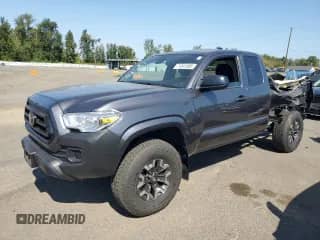 2023 Toyota Tacoma SR with VIN 3TYRX5GN9PT087510, listed as a Copart auction lot 71041585 with 13,094 mi miles and Salvage title. Bid and sale history available at DreamBid. Image 1.