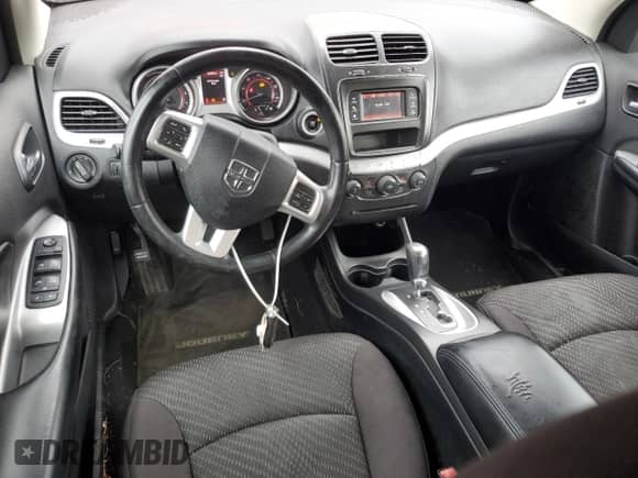 2014 Dodge Journey SXT with VIN 3C4PDCBB7ET118785, listed as a Copart auction lot 81487285 with 166,780 mi miles and Salvage title. Bid and sale history available at DreamBid. Image 8.