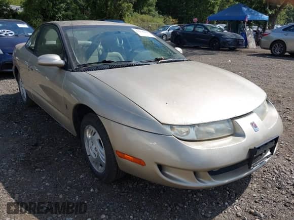1999 Saturn SC with VIN 1G8ZH1277XZ127585, listed as a IAAI auction lot 43275573 with 96,289 mi miles and . Bid and sale history available at DreamBid. Image 1.