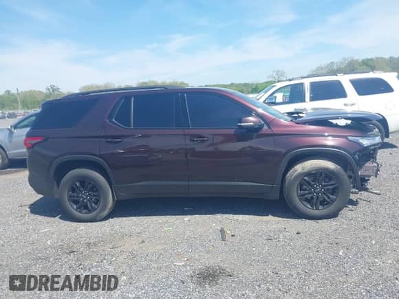 2022 Chevrolet Traverse LT Cloth with VIN 1GNEVGKW1NJ164383, listed as a IAAI auction lot 42144426 with 50,391 mi miles and . Bid and sale history available at DreamBid. Image 14.