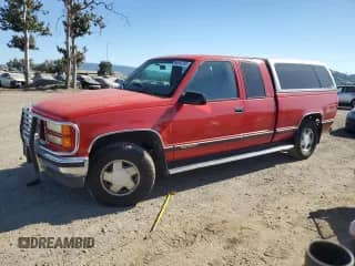 1997 GMC Sierra 1500 с VIN 2GTEK19R4V1571235, выставлен на аукционе Copart как лот 64047235 с пробегом 105 031 миль миль и Списание • Salvage title. История ставок и продаж доступна на DreamBid. Изображение 1.
