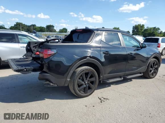2023 Hyundai Santa Cruz Night Edition with VIN 5NTJCDAFXPH074546, listed as a Copart auction lot 61218265 with 27,105 mi miles and Salvage title. Bid and sale history available at DreamBid. Image 3.