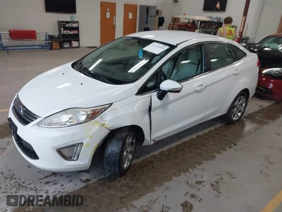 2012 Ford Fiesta SEL with VIN 3FADP4CJXCM161505, listed as a IAAI auction lot 42716954 with 153,982 mi miles and . Bid and sale history available at DreamBid. Image 2.