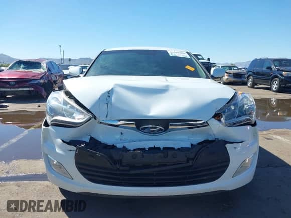 2014 Hyundai Veloster z VIN KMHTC6AD4EU213537, wystawiony jako IAAI lot #43358808 z przebiegiem 54 973 mil mil oraz . Historia ofert i sprzedaży dostępna na DreamBid. Obrazek 12.