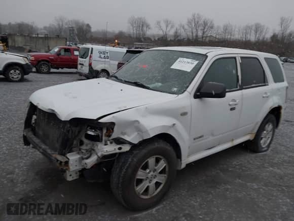 2008 Mercury Mariner with VIN 4M2CU91128KJ03668, listed as a IAAI auction lot 41213830 with 240,480 mi miles and . Bid and sale history available at DreamBid. Image 2.