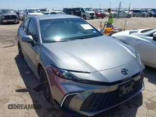 2025 Toyota Camry SE with VIN 4T1DAACK6SU536220, listed as a IAAI auction lot 42855354 with 9,596 mi miles and . Bid and sale history available at DreamBid. Image 1.