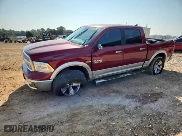 2014 Ram 1500 Laramie with VIN 1C6RR7NT1ES340818, listed as a Copart auction lot 80324675 with 445,556 mi miles and Salvage title. Bid and sale history available at DreamBid. Image 1.