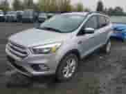 2018 Ford Escape SE с VIN 1FMCU9GD6JUA73829, выставлен на аукционе Copart как лот 90040835 с пробегом 84 854 миль миль и Чистый • Clean title. История ставок и продаж доступна на DreamBid. Изображение 1.