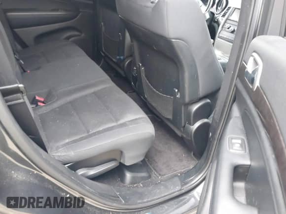 2011 Jeep Grand Cherokee 70th Anniversary with VIN 1J4RR4GG3BC582470, listed as a IAAI auction lot 42138291 with 241,429 mi miles and . Bid and sale history available at DreamBid. Image 8.