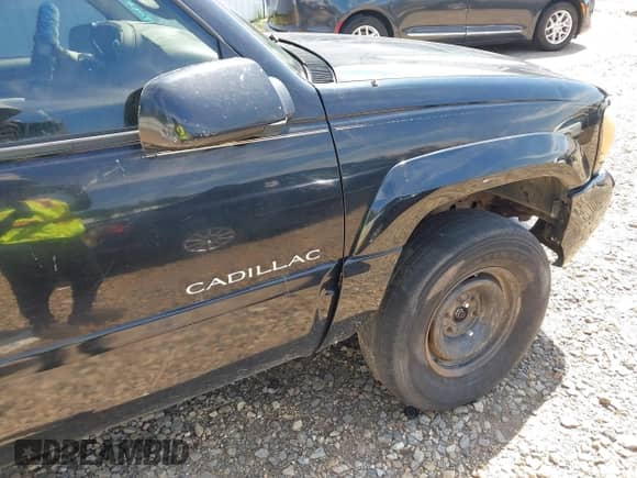 2000 Cadillac Escalade with VIN 1GYEK63R5YR208597, listed as a IAAI auction lot 43077206 with 298,699 mi miles and . Bid and sale history available at DreamBid. Image 13.