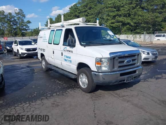 2013 Ford Econoline Cargo Commercial with VIN 1FTNE2EW7DDA67547, listed as a IAAI auction lot 43039595 with 156,606 mi miles and . Bid and sale history available at DreamBid. Image 1.