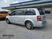 2009 Dodge Grand Caravan SXT with VIN 2D8HN541X9R663326, listed as a Copart auction lot 80393705 with 122,228 mi miles and Salvage title. Bid and sale history available at DreamBid. Image 2.