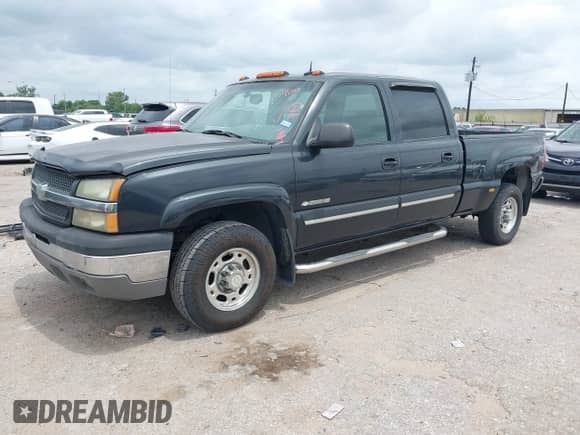 2003 Chevrolet Silverado 1500HD LS z VIN 1GCGK13U63F214778, wystawiony jako IAAI lot #42141435 z przebiegiem 161 669 mil mil oraz . Historia ofert i sprzedaży dostępna na DreamBid. Obrazek 2.