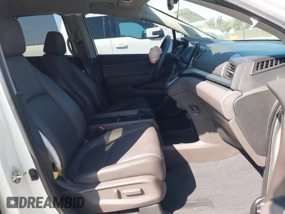 2020 Honda Odyssey EX-L with VIN 5FNRL6H77LB053187, listed as a IAAI auction lot 43335593 with 36,449 mi miles and . Bid and sale history available at DreamBid. Image 5.