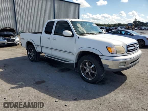 2002 Toyota Tundra Limited with VIN 5TBBT48172S298091, listed as a Copart auction lot 81839095 with 191,659 mi miles and Salvage title. Bid and sale history available at DreamBid. Image 4.