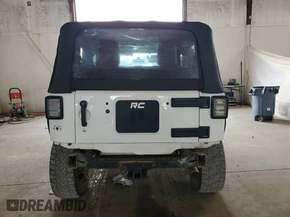 2013 Jeep Wrangler Sport with VIN 1C4AJWAG4DL503048, listed as a Copart auction lot 60678285 with 109,199 mi miles and Salvage title. Bid and sale history available at DreamBid. Image 6.