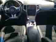 2012 Jeep Grand Cherokee SRT-8 z VIN 1C4RJFDJ7CC211421, wystawiony jako Copart lot #55883505 z przebiegiem 96 877 mil mil oraz Szkoda całkowita • Salvage title. Historia ofert i sprzedaży dostępna na DreamBid. Obrazek 8.