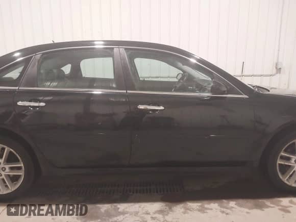 2010 Chevrolet Impala LTZ z VIN 2G1WC5EMXA1155924, wystawiony jako IAAI lot #43445319 z przebiegiem 209 290 mil mil oraz . Historia ofert i sprzedaży dostępna na DreamBid. Obrazek 13.