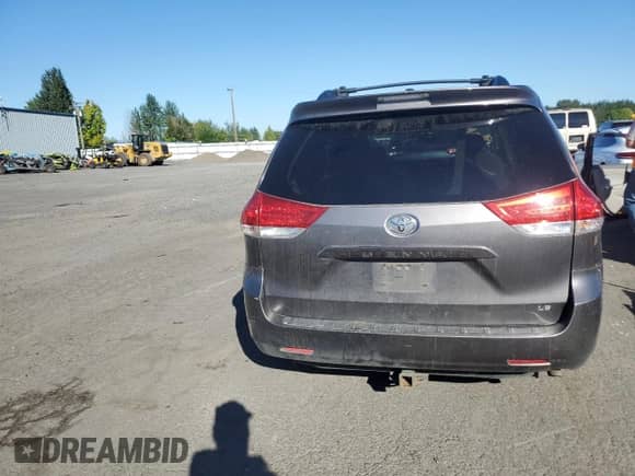 2011 Toyota Sienna LE with VIN 5TDKK3DC7BS121990, listed as a Copart auction lot 80665295 with 234,713 mi miles and Salvage title. Bid and sale history available at DreamBid. Image 6.
