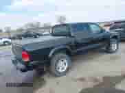 2002 Dodge Dakota with VIN 1B7HG38X22S602908, listed as a IAAI auction lot 41673539 with 111,207 mi miles and . Bid and sale history available at DreamBid. Image 4.