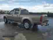 2003 Nissan Frontier XE with VIN 1N6ED29X33C464373, listed as a Copart auction lot 70272955 with 249,282 mi miles and Salvage title. Bid and sale history available at DreamBid. Image 2.