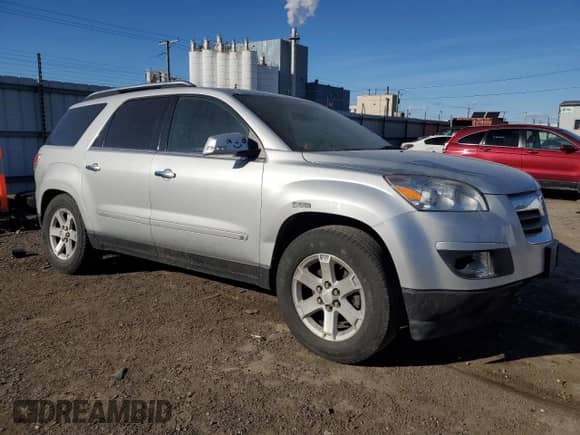 2009 Saturn Outlook XR with VIN 5GZER23DX9J136471, listed as a Copart auction lot 42747005 with 142,994 mi miles and Salvage title. Bid and sale history available at DreamBid. Image 4.