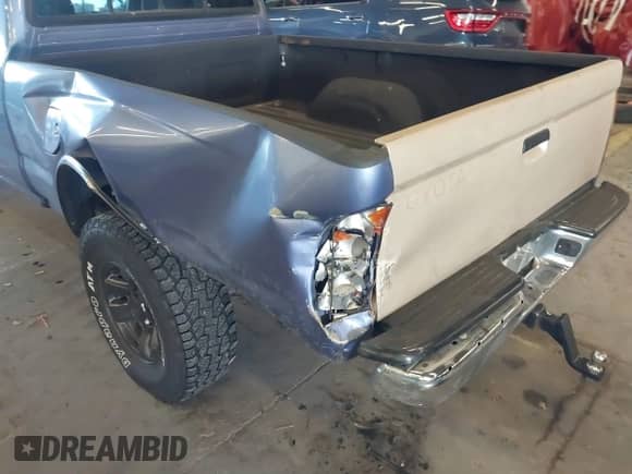 2000 Toyota Tacoma with VIN 4TAWM72N5YZ650056, listed as a IAAI auction lot 41680278 with 257,819 mi miles and . Bid and sale history available at DreamBid. Image 13.