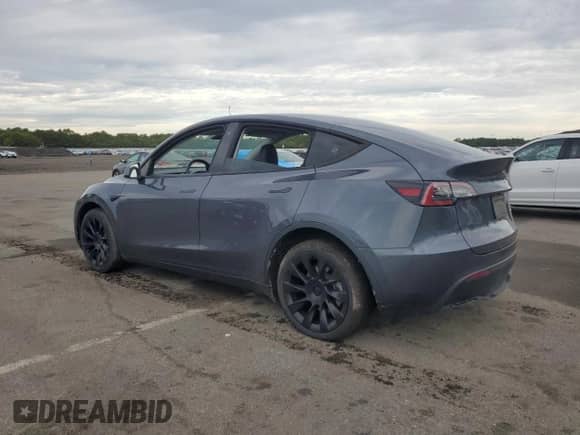 2023 Tesla Model Y Long Range with VIN 7SAYGDEE6PF693505, listed as a Copart auction lot 81774175 with 32,396 mi miles and Salvage title. Bid and sale history available at DreamBid. Image 2.