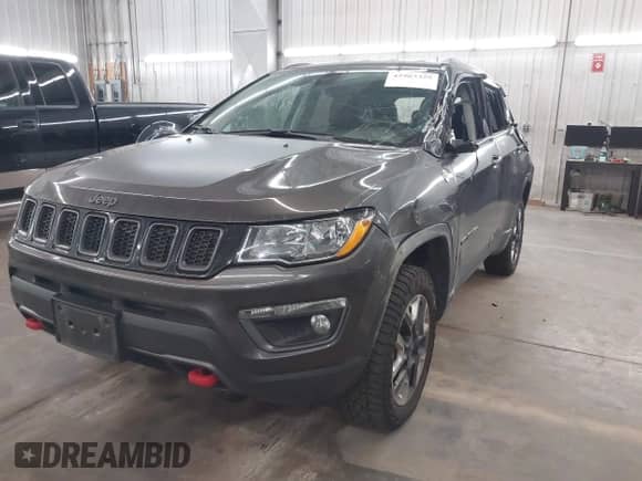 2018 Jeep Compass Trailhawk with VIN 3C4NJDDB5JT419357, listed as a IAAI auction lot 42963355 with 124,314 mi miles and . Bid and sale history available at DreamBid. Image 17.
