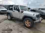 2012 Jeep Wrangler Sport с VIN 1C4AJWAG6CL267694, выставлен на аукционе Copart как лот 63449144 с пробегом 86 642 миль миль и Списание • Salvage title. История ставок и продаж доступна на DreamBid. Изображение 4.