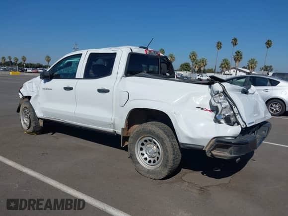 2023 Chevrolet Colorado 4WD Work Truck z VIN 1GCGTBEC4P1196467, wystawiony jako IAAI lot #43223271 z przebiegiem 35 010 mil mil oraz . Historia ofert i sprzedaży dostępna na DreamBid. Obrazek 3.