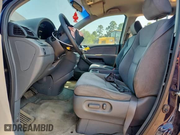 2007 Honda Odyssey EX z VIN 5FNRL38417B031602, wystawiony jako Copart lot #71609975 z przebiegiem 190 959 mil mil oraz Szkoda całkowita • Salvage title. Historia ofert i sprzedaży dostępna na DreamBid. Obrazek 7.