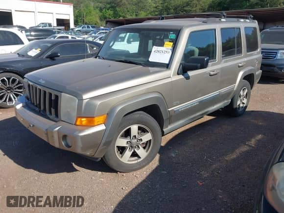 2006 Jeep Commander with VIN 1J8HH48N76C293897, listed as a IAAI auction lot 42021253 with 214,412 mi miles and . Bid and sale history available at DreamBid. Image 2.