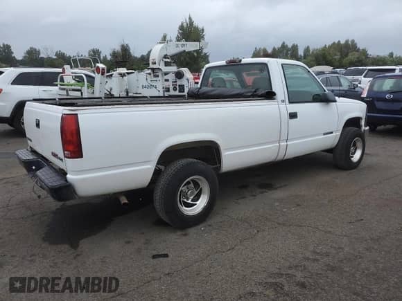 1997 GMC Sierra 1500 z VIN 1GTEK14W6VZ549578, wystawiony jako Copart lot #67808705 z przebiegiem 203 467 mil mil oraz Czysty tytuł • Clean title. Historia ofert i sprzedaży dostępna na DreamBid. Obrazek 3.