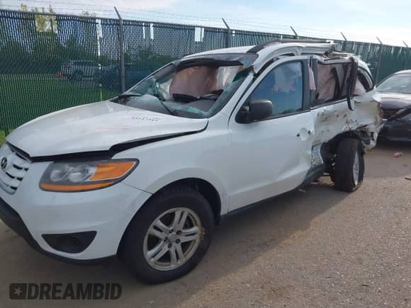 2010 Hyundai Santa Fe GLS with VIN 5NMSGDAB0AH381989, listed as a IAAI auction lot 43137343 with 203,000 mi miles and . Bid and sale history available at DreamBid. Image 17.