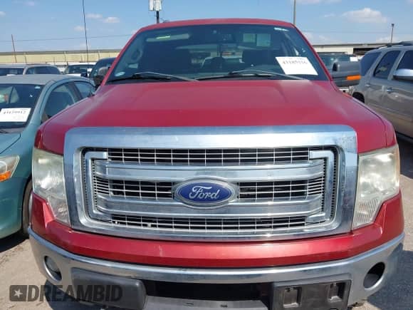 2013 Ford F-150 Lariat with VIN 1FTFW1ET5DKD59128, listed as a IAAI auction lot 43185916 with 135,162 mi miles and . Bid and sale history available at DreamBid. Image 12.