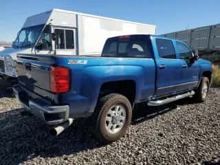 2015 Chevrolet Silverado 3500HD LTZ с VIN 1GC4K0E80FF577143, выставлен на аукционе Copart как лот 76626244 с пробегом 41 587 миль миль и Списание • Salvage title. История ставок и продаж доступна на DreamBid. Изображение 3.