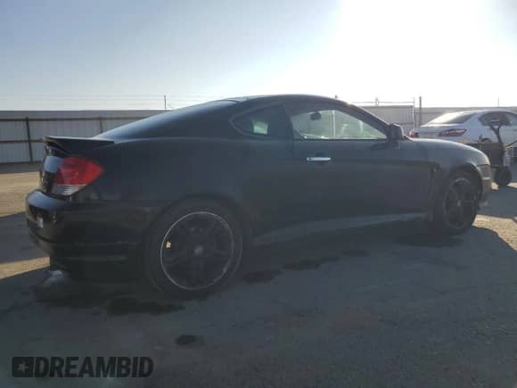 2006 Hyundai Tiburon GT с VIN KMHHN65F46U217049, выставлен на аукционе Copart как лот 87972565 с пробегом 88 945 миль миль и Чистый • Clean title. История ставок и продаж доступна на DreamBid. Изображение 3.