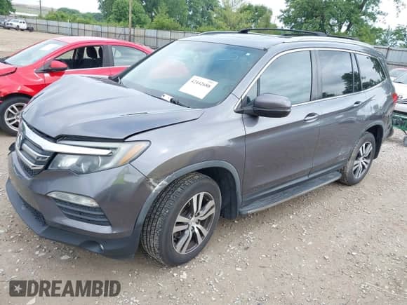 2016 Honda Pilot EX-L with VIN 5FNYF6H89GB005885, listed as a IAAI auction lot 42442688 with 173,204 mi miles and . Bid and sale history available at DreamBid. Image 2.