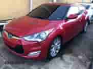 2015 Hyundai Veloster z VIN KMHTC6AD0FU238274, wystawiony jako Copart lot #73207244 z przebiegiem 143 112 mil mil oraz Czysty tytuł • Clean title. Historia ofert i sprzedaży dostępna na DreamBid. Obrazek 2.
