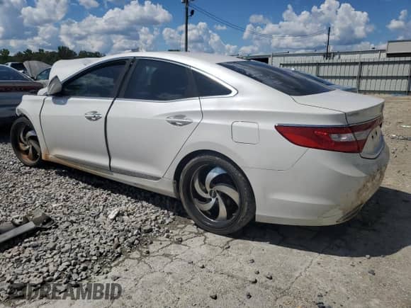 2014 Hyundai Azera z VIN KMHFG4JG7EA355348, wystawiony jako Copart lot #68931814 z przebiegiem Nie podano mil oraz Szkoda całkowita • Salvage title. Historia ofert i sprzedaży dostępna na DreamBid. Obrazek 2.