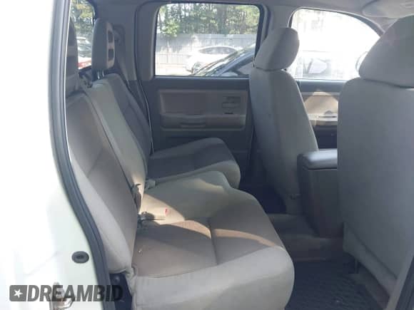 2005 Dodge Dakota SLT with VIN 1D7HW48N95S287753, listed as a IAAI auction lot 42806103 with 166,000 mi miles and . Bid and sale history available at DreamBid. Image 8.