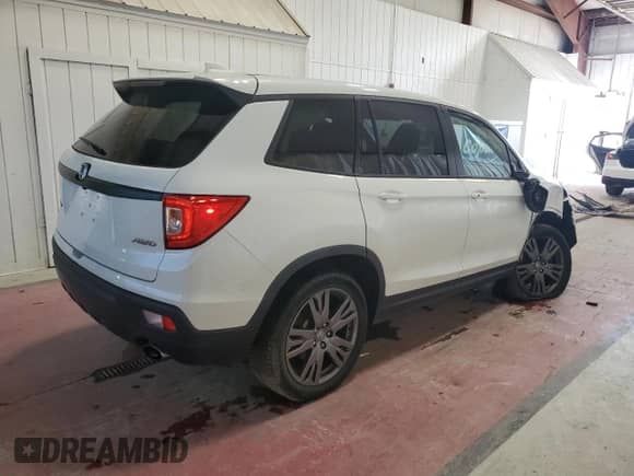 2021 Honda Passport EX-L z VIN 5FNYF8H5XMB033837, wystawiony jako Copart lot #71701255 z przebiegiem 67 044 mil mil oraz Czysty tytuł • Clean title. Historia ofert i sprzedaży dostępna na DreamBid. Obrazek 3.