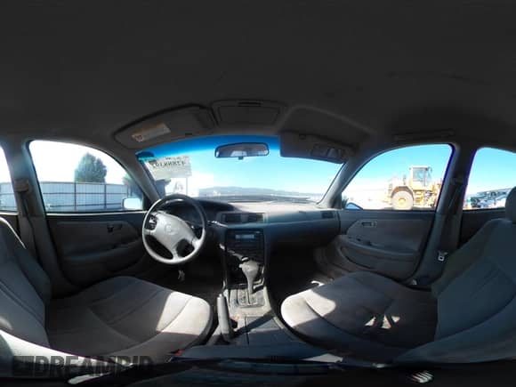 2000 Toyota Camry CE z VIN 4T1BG22KXYU704981, wystawiony jako IAAI lot #42888392 z przebiegiem 272 761 mil mil oraz . Historia ofert i sprzedaży dostępna na DreamBid. Obrazek 19.